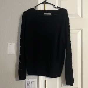 Cute black sweater with studs on sleeves